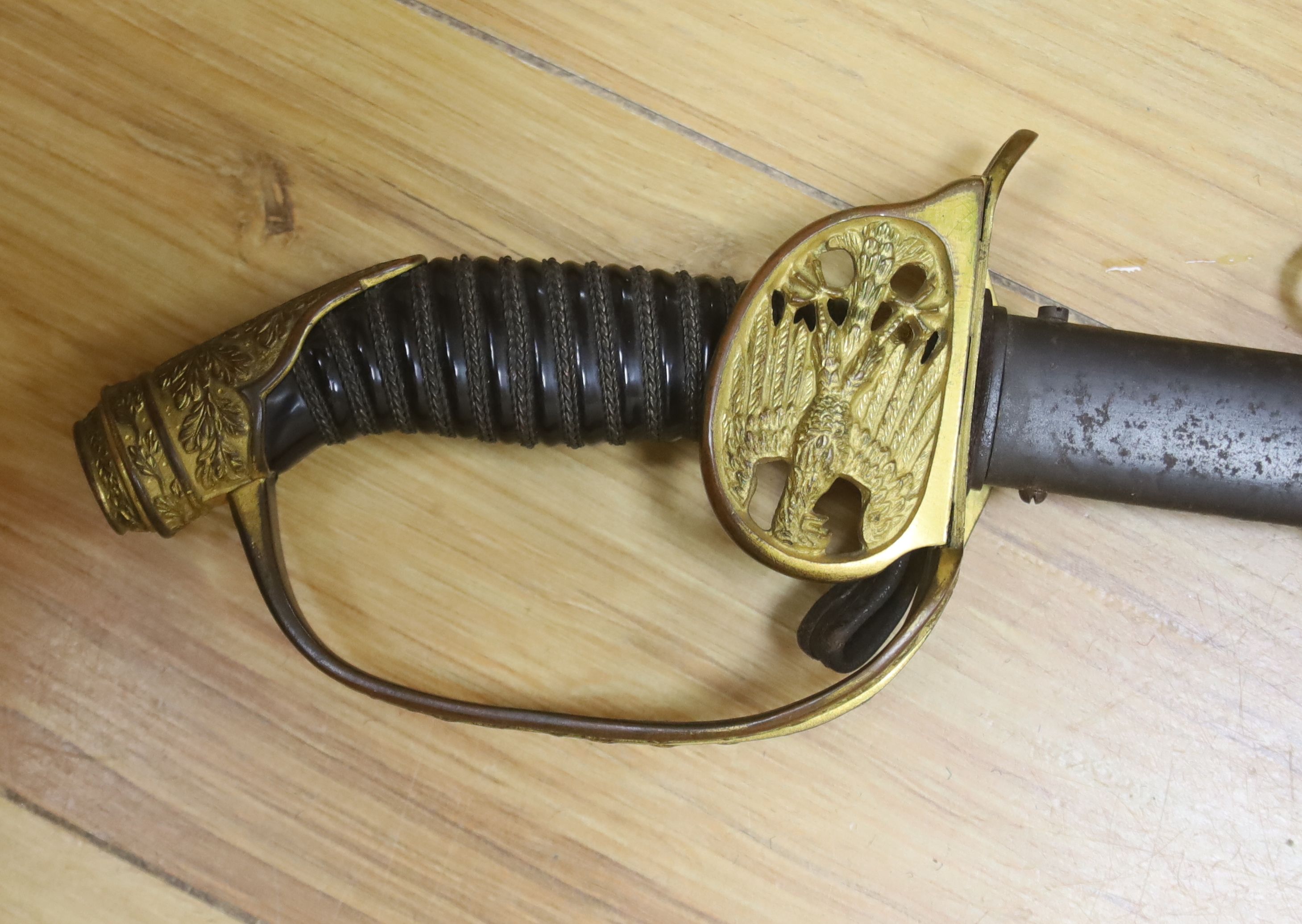 A late 19th century German Officer's sword, overall length 99cm, Carl Eickhorn blade